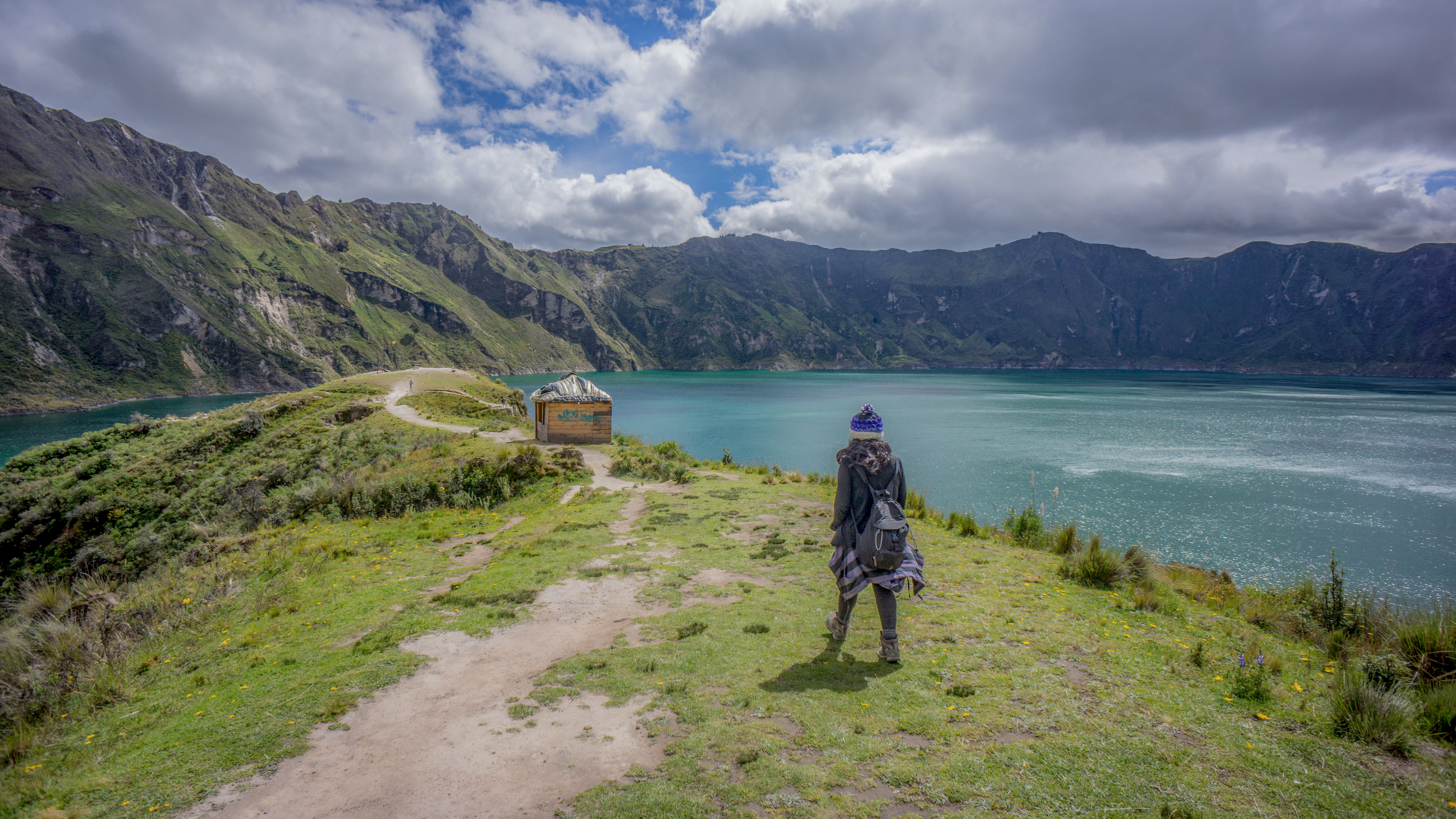 A young woman walking on the crater